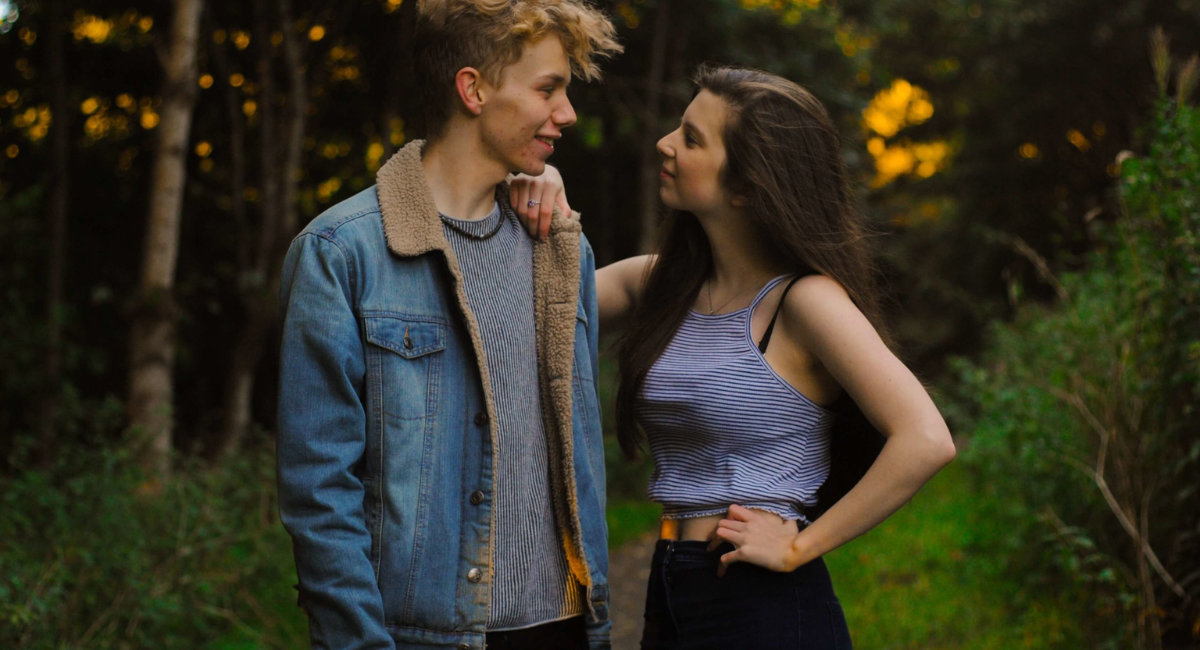 Couple smiling and enjoying quality time together, showing healthy ways to keep your partner emotionally connected.
