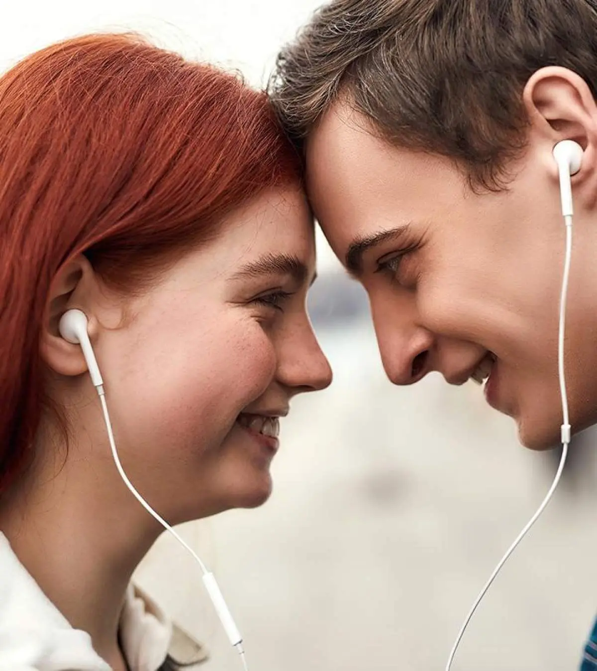 Moody illustration of a person listening to music while thinking about a distant relationship, symbolizing the emotions of loving someone who is emotionally unavailable.