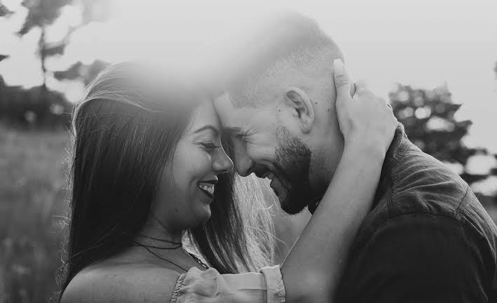 Couple sharing a peaceful and affectionate moment together, representing a loving relationship with an introvert.