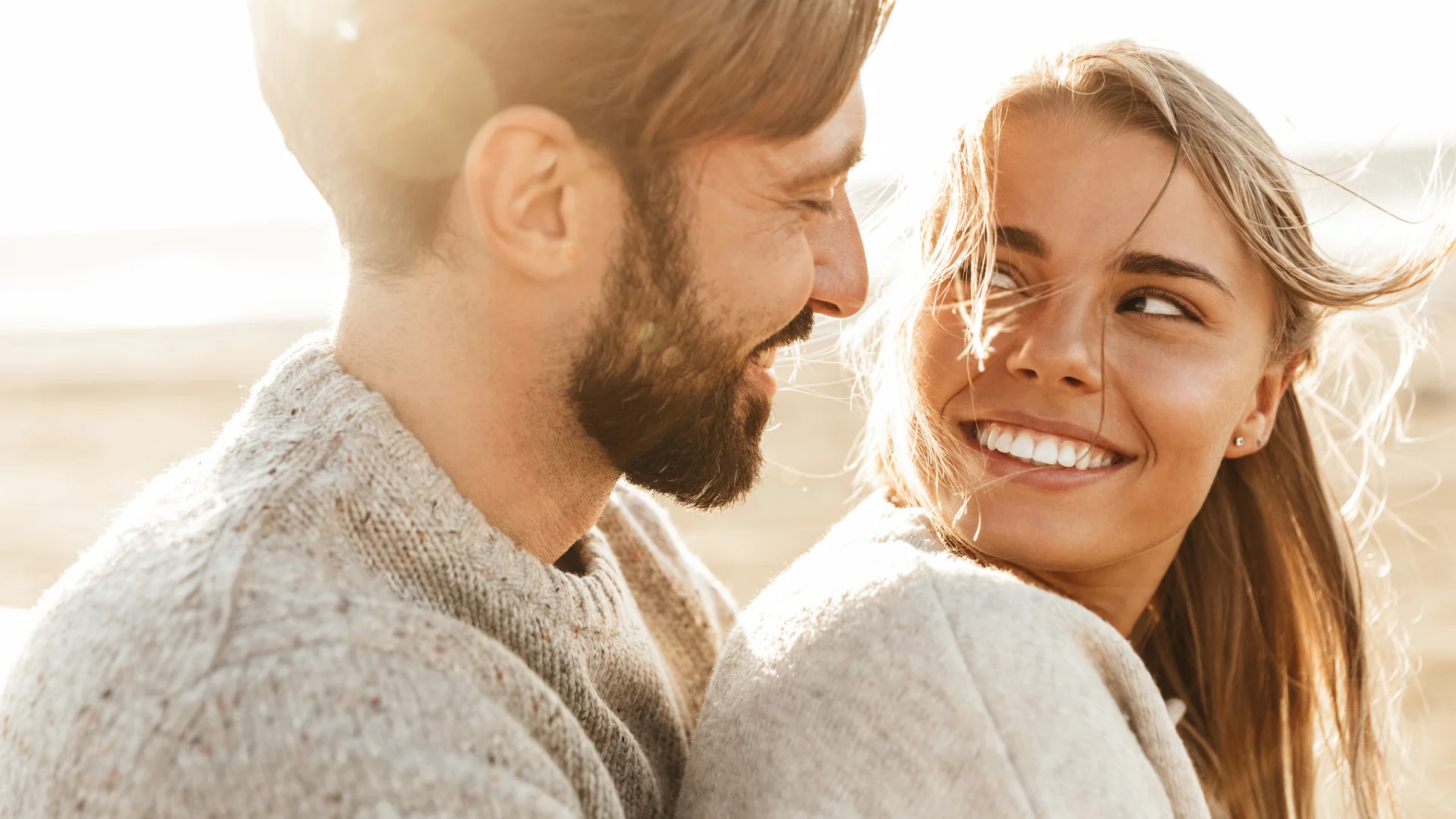 Romantic couple surrounded by glowing cosmic energy symbolizing deep soul connections and spiritual bonds.