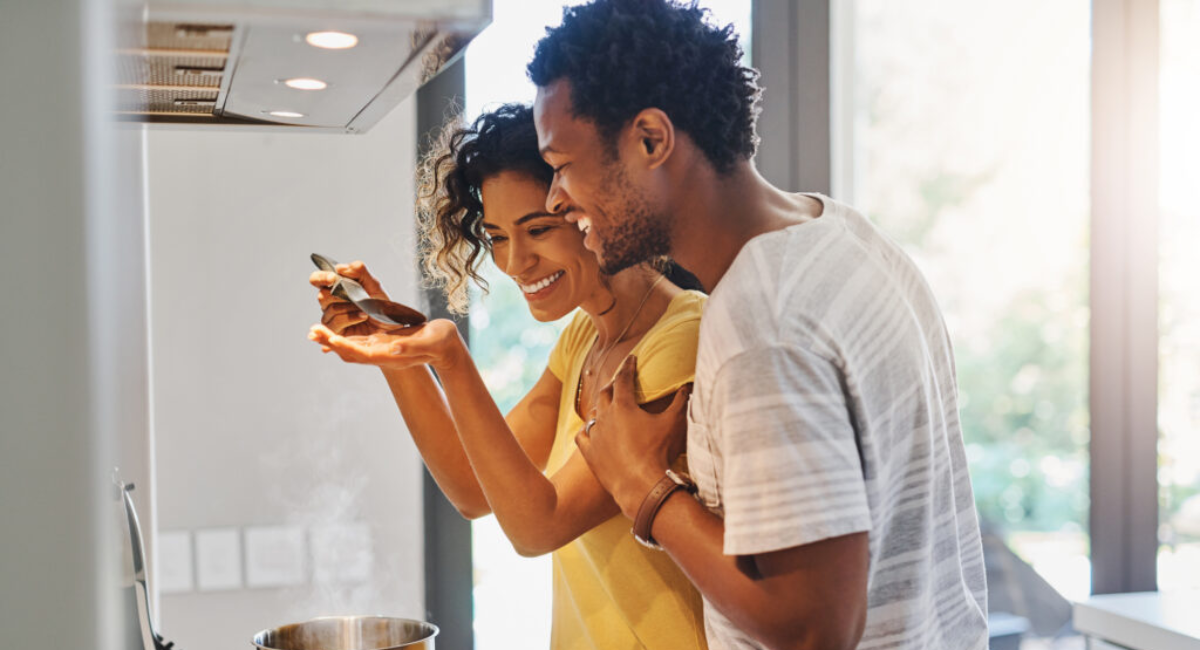 A happy couple enjoying a meaningful conversation while building trust and emotional connection in a healthy relationship.