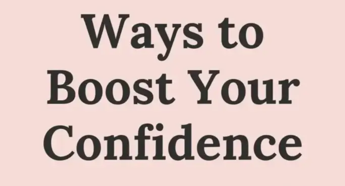 A smiling person standing confidently outdoors, symbolizing self-esteem, personal growth, positive mindset, and everyday confidence.