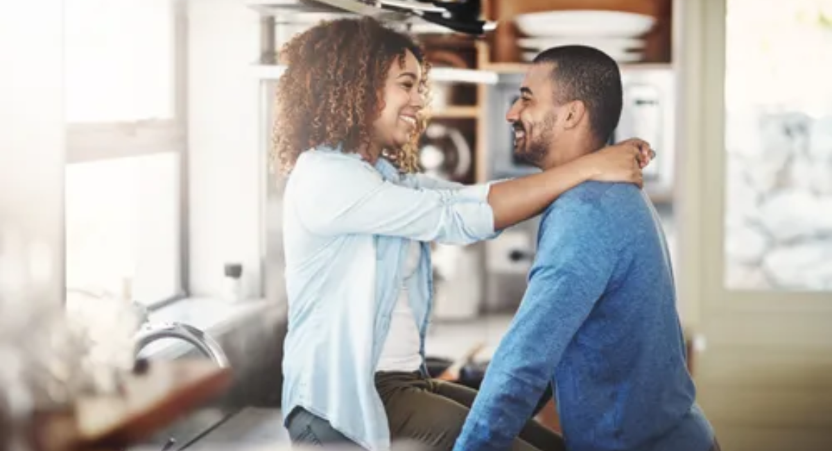 A happy couple enjoying a peaceful moment together while talking and strengthening their healthy relationship through communication and trust.